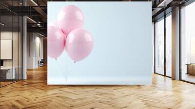 A pink balloon bouquet is floating in the air. The balloons are arranged in a pyramid shape, with the largest one at the bottom and the smallest one at the top. Concept of celebration and joy Wall mural