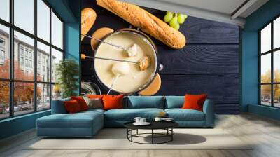 Cheese fondue with bread wine and grape Wall mural