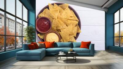 Crispy chips nachos with tomato and cheese sauce Wall mural