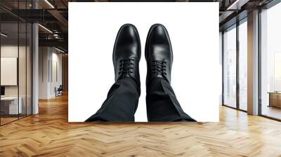 A pair of black shoes on a person's feet against a white background, showcasing a clean, professional look. Generative AI Wall mural