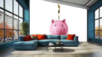 A pink piggy bank with coins falling into the slot, set against a white background, representing savings concept Wall mural