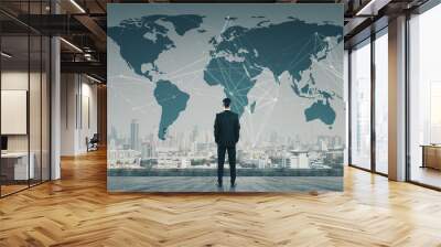 Businessman standing on roof Wall mural