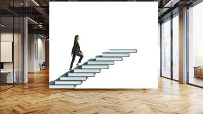 Businesswoman climbing stairs made of books on a white background. Concept of career growth, education, and success in a clean layout Wall mural