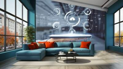 Cloud technology concept with digital tablet on human hand and virtual projection with different cloud service signs: security, loupe, computer and data on blurry office background Wall mural