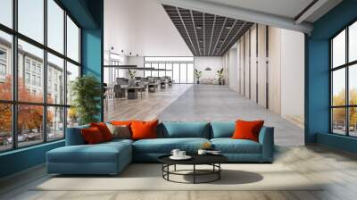 Front view on concrete floor area in modern open space office with lounge sofa, rows of work places with modern computers and wooden decorated walls. 3D rendering Wall mural