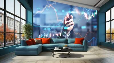 Global investment concept with businessman touching digital screen with forex chart graphs by pen Wall mural