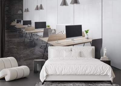 Perspective view on minimalistic style workspaces with modern computers on light wooden tables, black office chairs on dark marble floor near light matte walls. 3D rendering Wall mural