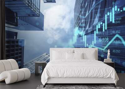 Real estate, development and investing concept with financial chart indicators and stock market graphs on city skyscrapers tops bottom view, double exposure Wall mural