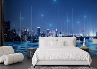 Smart city and big data connection technology concept with digital blue wavy wires with antennas on night megapolis city skyline background, double exposure Wall mural