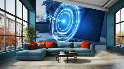 Target concept with a glowing hologram of bullseye and arrow hitting the center. Growth strategy. Goals achievement, success. Close up of laptop on blurry desktop background. Double exposure. Wall mural