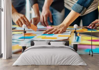 Team hands working with sticky notes on table, creative meeting concept, blurred background. Generative AI Wall mural