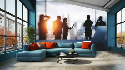 Teamwork and workshop concept. Group of young businesspeople working together in modern office interior with bright city view. Wall mural