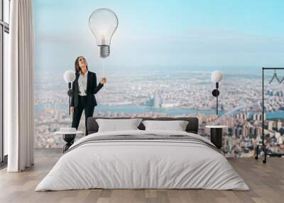 Woman with lamp balloon Wall mural