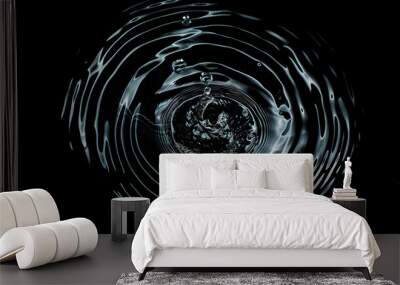 top view of water ripple, a drop of water on black background, flat lay photography Wall mural