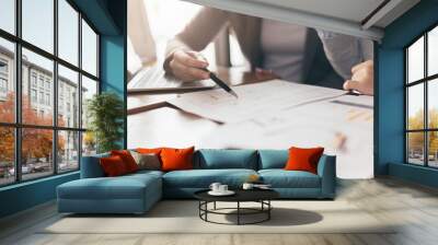 business working with woman and friend with laptop and paperwork with color tone effect Wall mural