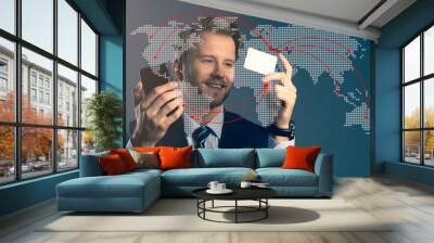 close up businessman formal suit hand hold smartphone and credit card world wide business connecting global purchase ideas concept Wall mural