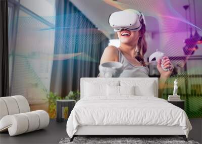 exitied enjoy 3d virtual gaming futuristic experience young asian female wear vr headset technology watching simulation digital world hand gesture control herself to beat the online fun virtual gaming Wall mural