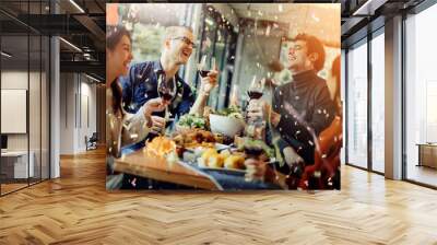 happiness friends christmas eve celebrate dinner party with food wine and laugh together with joyful moment Wall mural