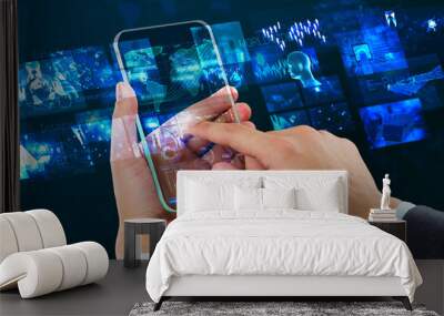 male using transparency futuristic smart phone Wall mural