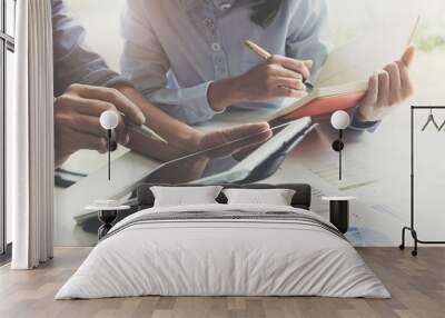 Businessman and partner hand using digital tablet and making presentation business strategy. Wall mural