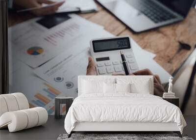 accountant or banker making calculations. Savings, finances and economy concept. Wall mural