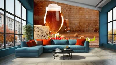 Blue cheese appetizer and beer on brown vintage background Wall mural