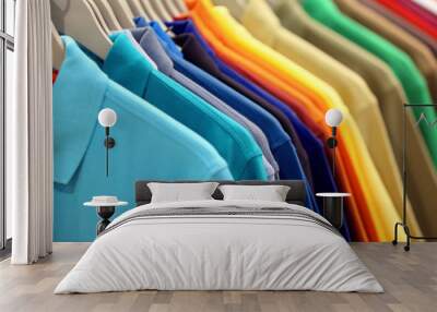 Row of men's polo shirts in wardrobe or store Wall mural