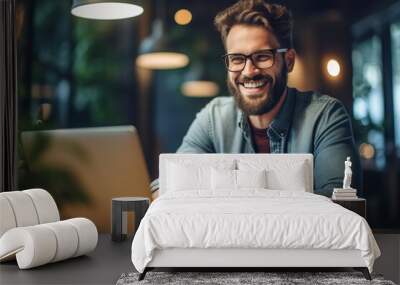  happy man on laptop computer doing online course Wall mural