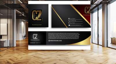 initial letter CZ logotype company name colored gold elegant design. Vector sets for business identity on black background. Wall mural