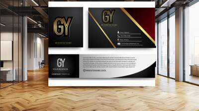 initial letter GY logotype company name colored gold elegant design. Vector sets for business identity on black background. Wall mural