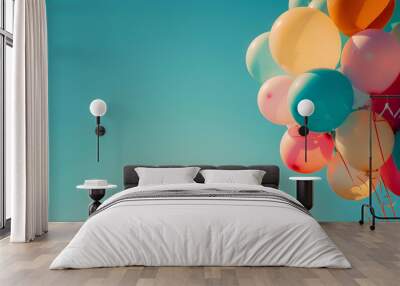 Balloons in the corner of the frame against a clear sky, leaving plenty of space for celebratory text Wall mural