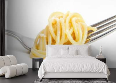 Fork rolled spaghetti on white background. Wall mural