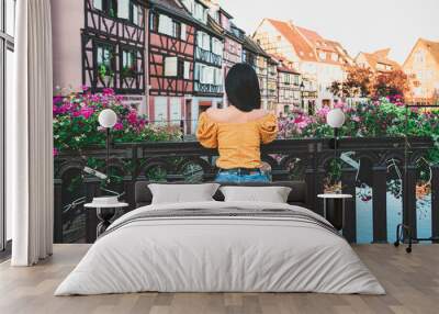 Young tourist female enjoying in Colmar France. Wall mural