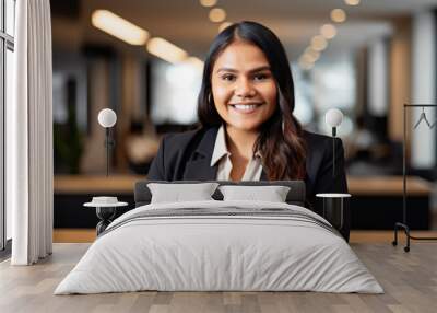 Portrait of a Well Dressed Professional Indigenous First Nations Businesswoman in a Modern Office. Smiling Female Native American Businesswoman Wearing a Business Suit in the Workplace. Generative AI. Wall mural