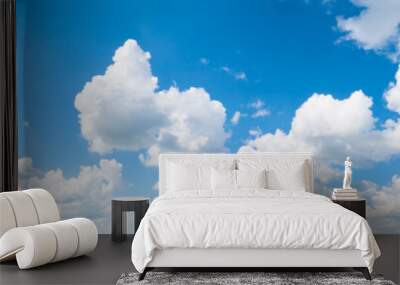 Blue sky background with clouds Wall mural