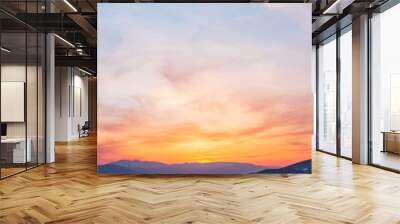 Sunset sky above mountains Wall mural