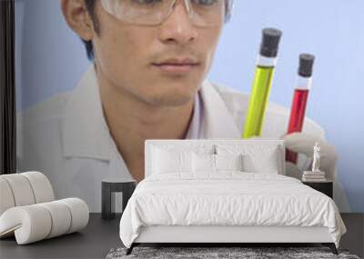 student researcher with 2 test tubes Wall mural