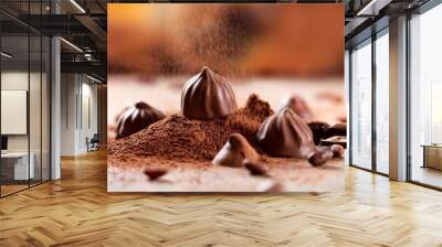 close up of falling chocolates on a blurry background featuring cocoa macro details and tasty bonbons explore the richness of dark cocoa and organic ingredients in this delicious dessert scene Wall mural