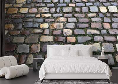 really old rough cobblestone street Wall mural