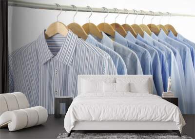 men's shirts on hangers on white Wall mural