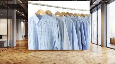 men's shirts on hangers on white Wall mural