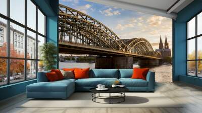 cologne cathedral and hohenzollern bridge at sunset Wall mural