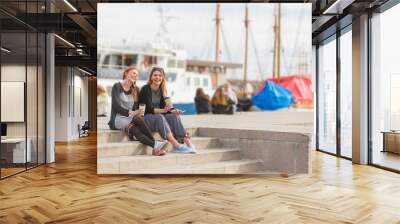 Two beautiful nordic girls enjoying life at Oslo harbour Wall mural