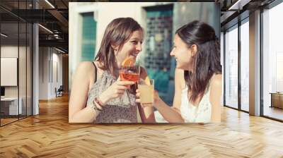 Two Young Women Cheering with Cold Drinks Wall mural