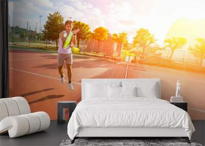 Young Man Playing Tennis Wall mural