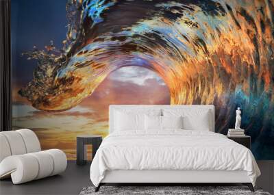 Colorful Ocean Wave. Sea water in crest shape. Sunset light and beautiful clouds on background Wall mural