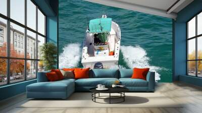 Fishing boat speeding on the Florida Intra-Coastal Waterway off Miami Beach Wall mural