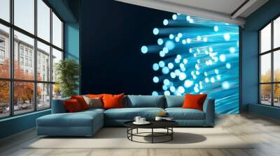 A futuristic network connection visualized with glowing blue data flowing through fiber optics. Wall mural