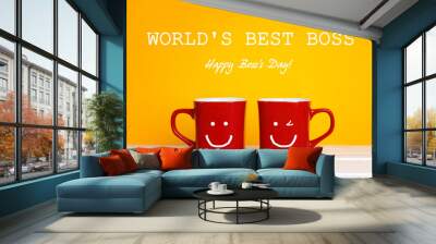 Boss day greeting card with two red coffee mugs with a smiling faces on a yellow background. Wall mural