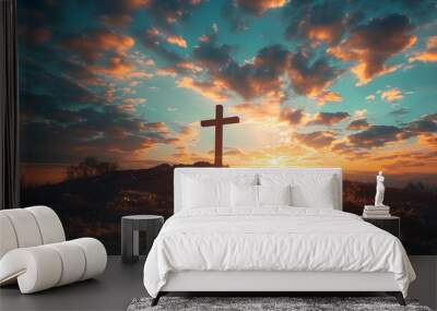 A wooden cross on a hill at sunset. The sky is a mix of blue, red, and purple clouds. Wall mural